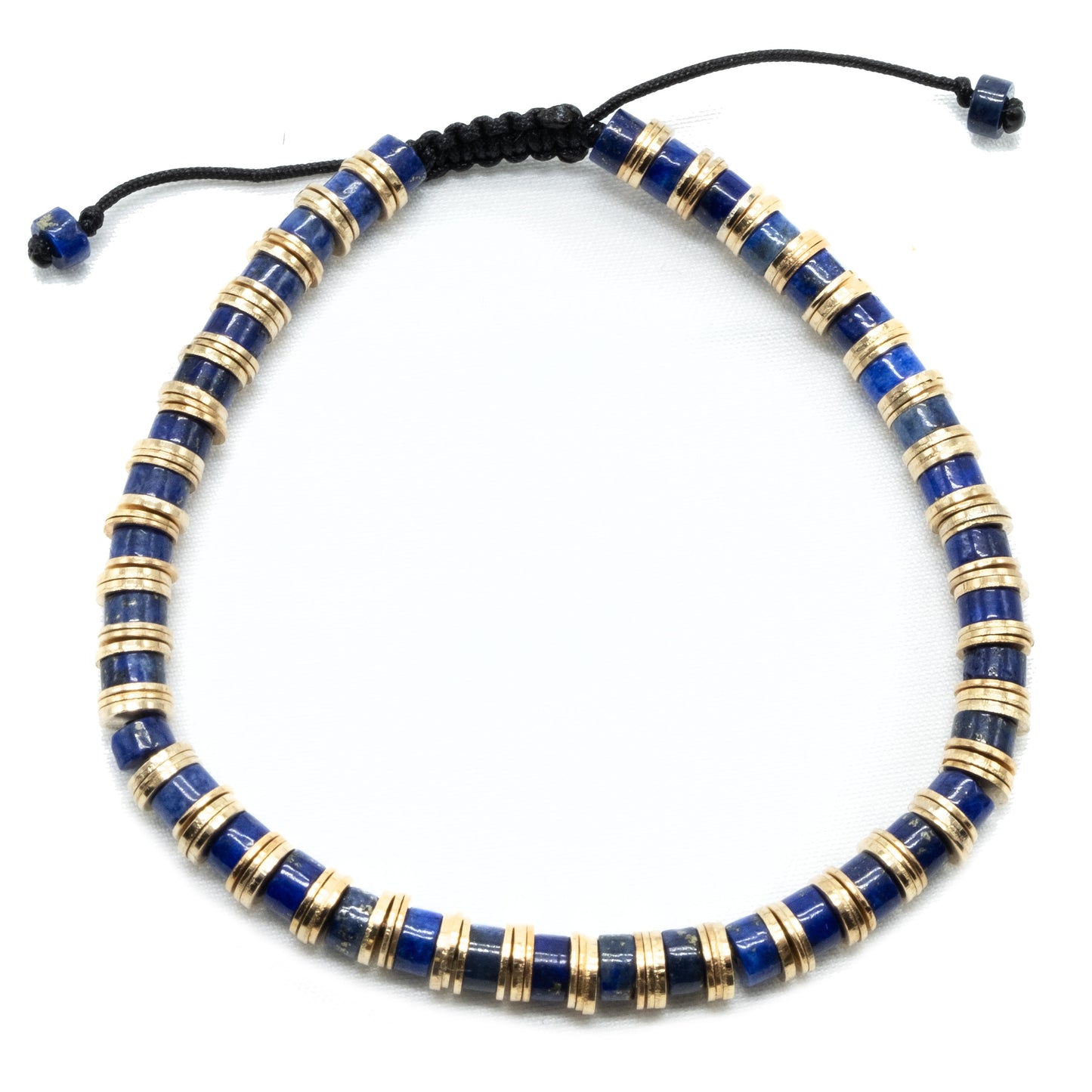 4mm Lapis Lazuli Flat Randal Heishi with gold spacer beaded bracelet. Adjustable sizing. Semi-precious gemstone